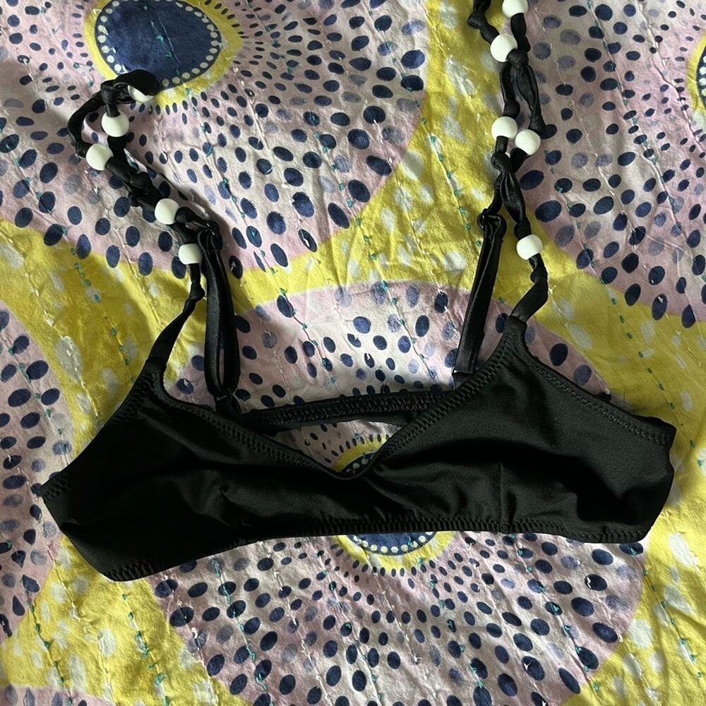 Solid and stripe beaded top.